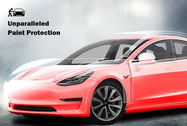 A white Tesla Model 3 is highlighted with a transparent red overlay across its body panels, illustrating areas covered by paint protection film. The text reads “Unparalleled Paint Protection” alongside an icon of a person cleaning a car.